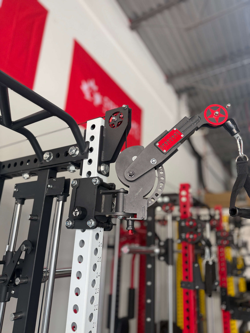 Detail view of Spartaks Strength KB2406 6-Post Full Rack Functional Trainer (3”×3”, 9-Gauge Steel) pulley system.