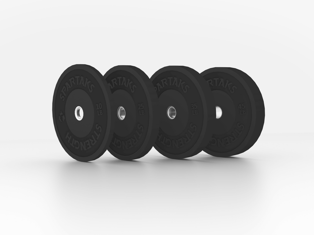 Spartaks Strength High Performance Bumper Plates (10LB to 55LB) displayed on a clean white background.