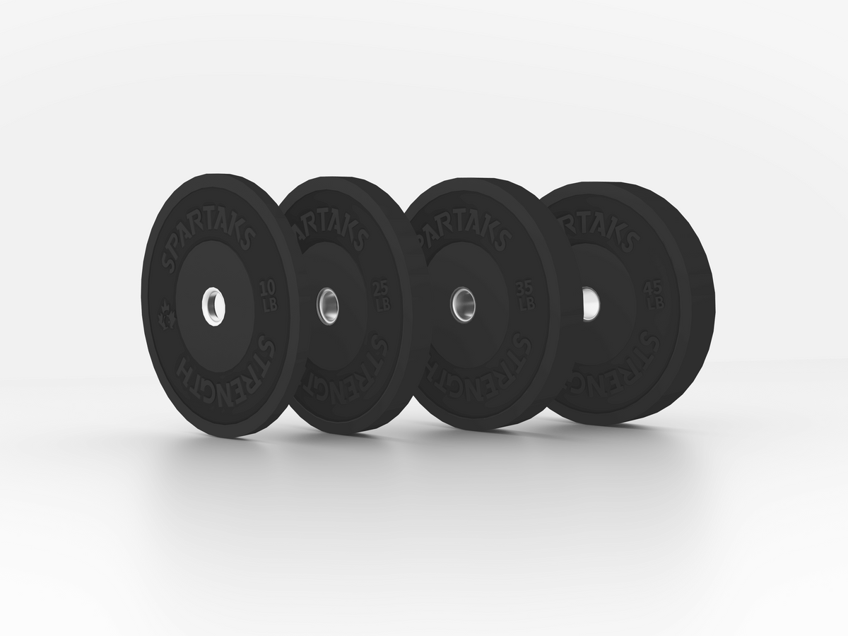 Spartaks Strength High Performance Bumper Plates (10LB to 55LB) displayed on a clean white background.