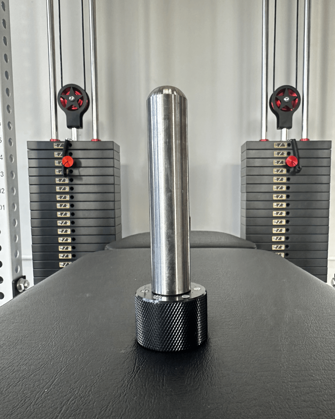 Spartaks Strength Magnetic Rack Attachment Pin displayed on gym equipment, perfect for secure adjustments in home gym setups.